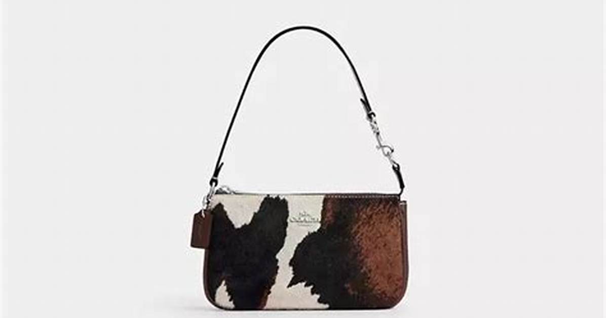 The Ultimate Coach Cow Print Bag Buying Guide Sizes Prices Care Tips And