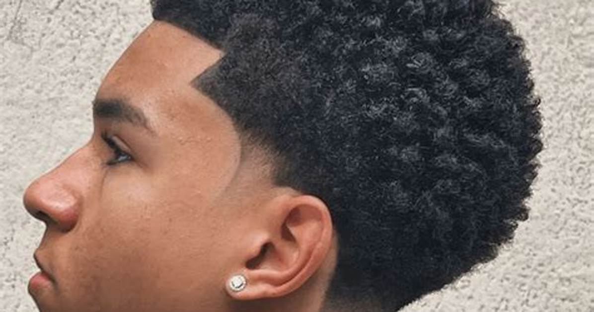 Why the Afro Low Taper Is Replacing High Fades the Viral Shift in Men S